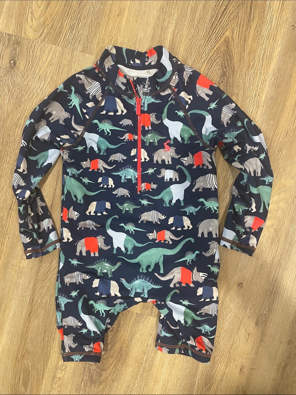 Joules Kids One-Piece Swimsuit in Navy with Dinosaurs, rhinos and bears